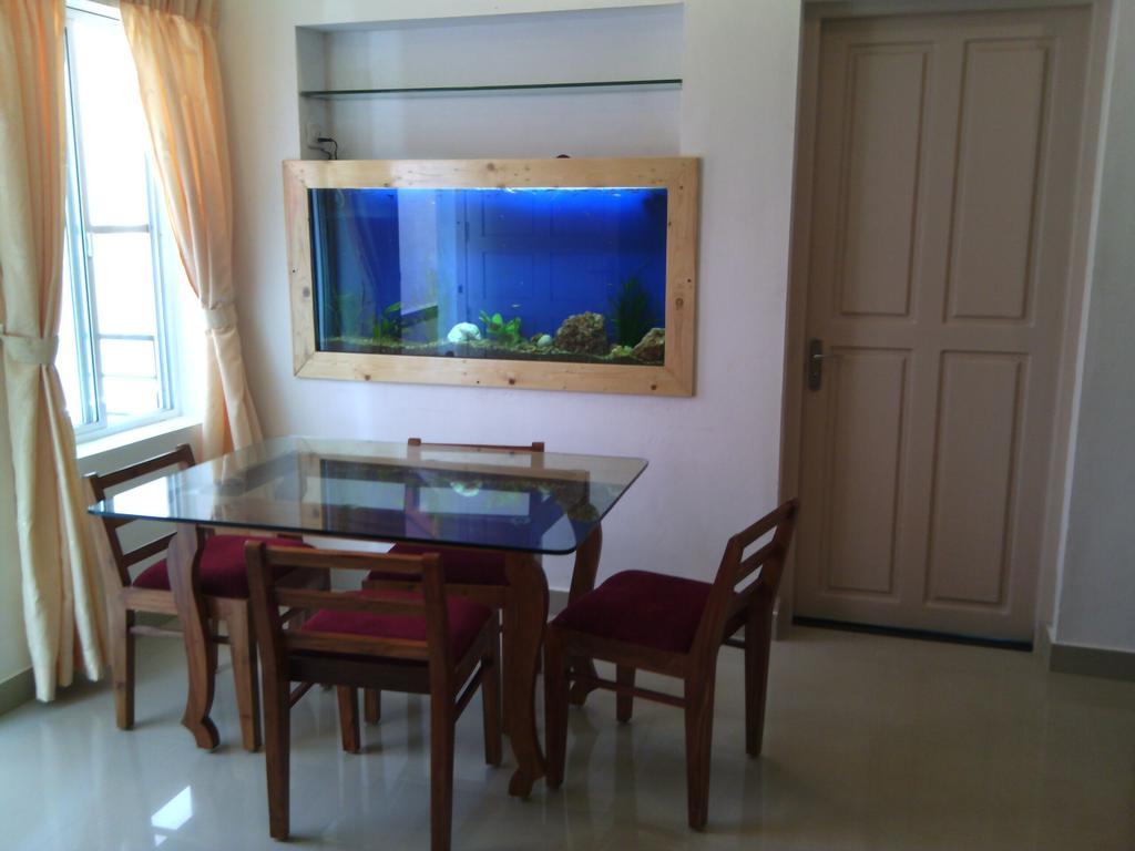 Nathans Holiday Home Kochi Quarto foto